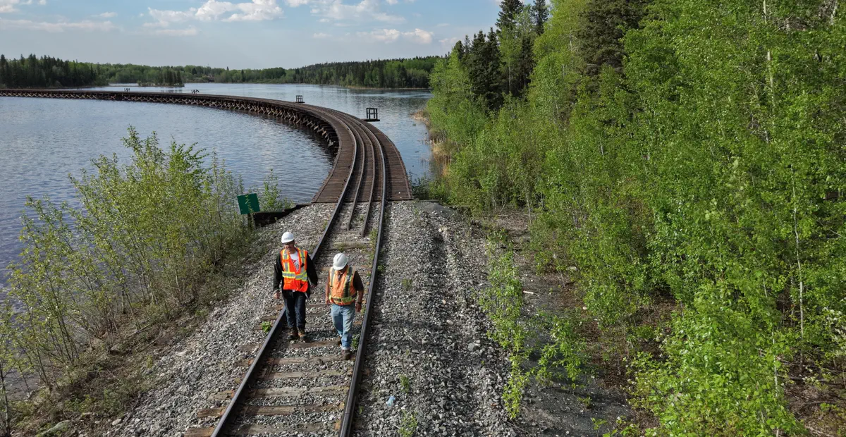 Railway inspectors assessing Hudson Bay Railway track and bridge infrastructure