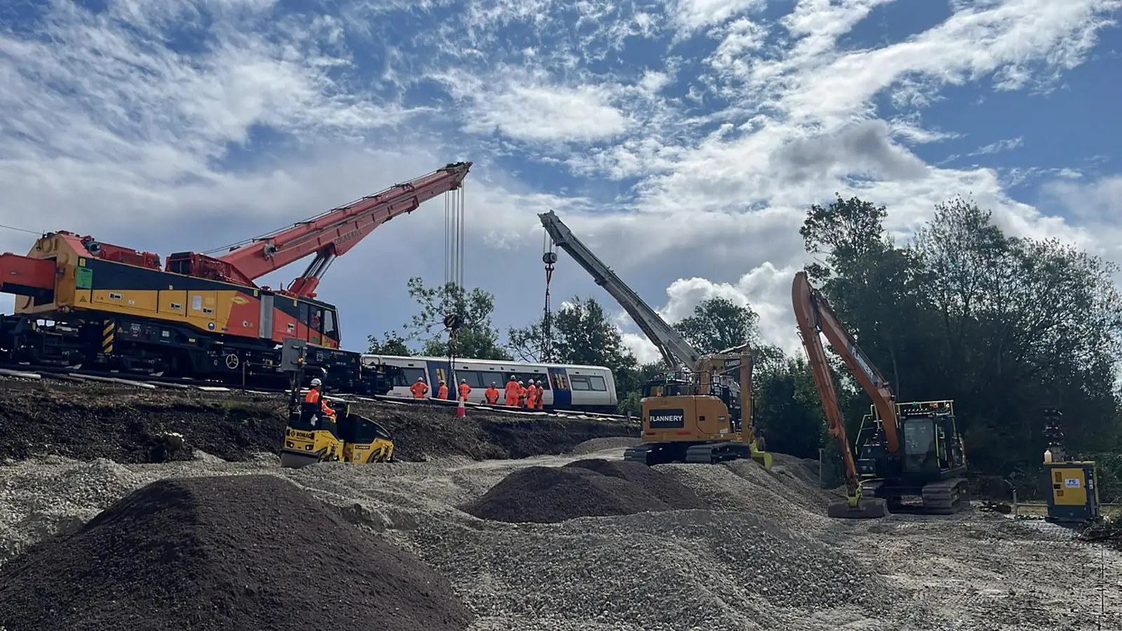 Recovery crews and rail cranes at the Lewes derailment site