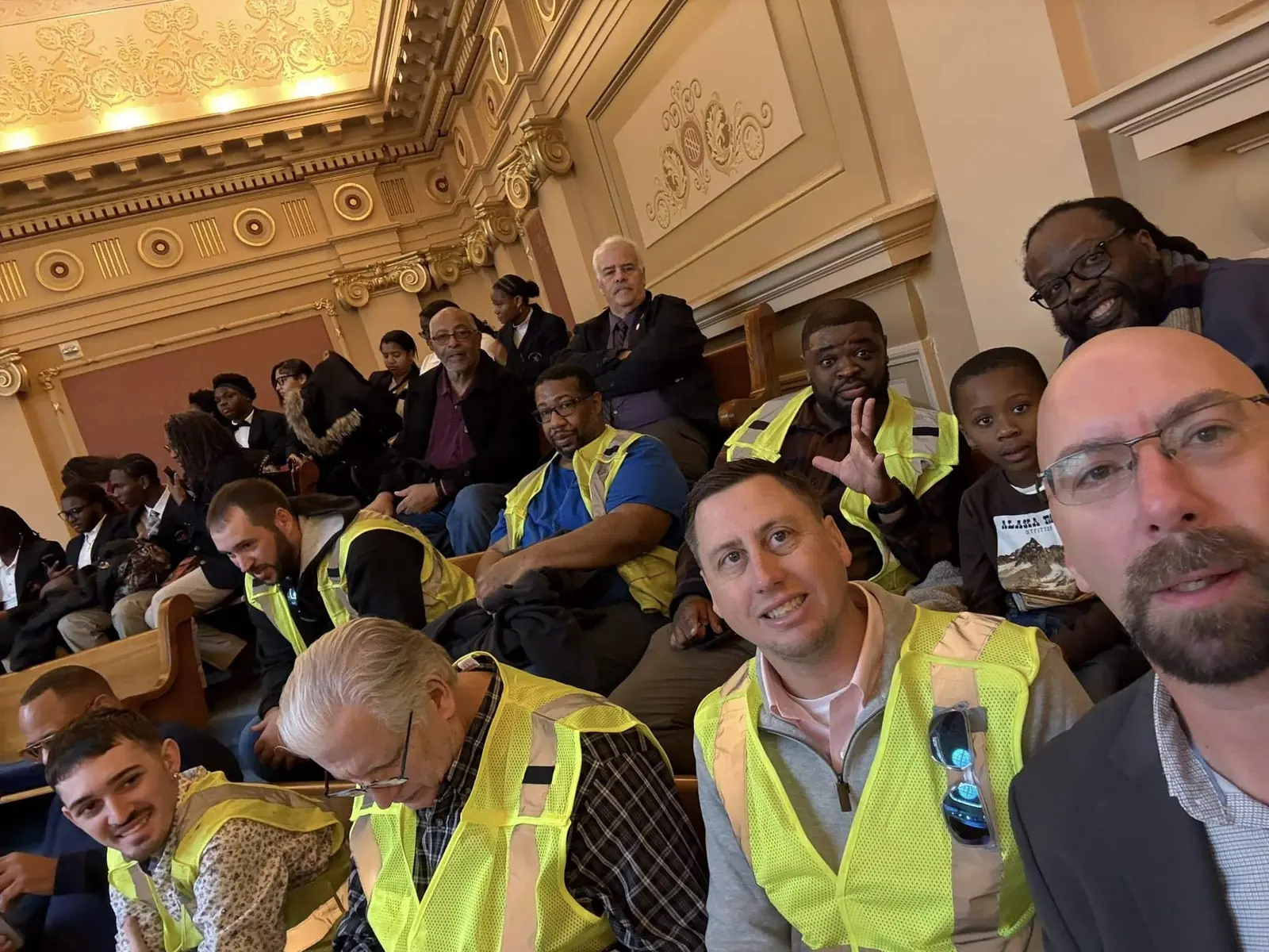 SMART-TD members seated inside the Virginia Capitol during the two-person crew campaign