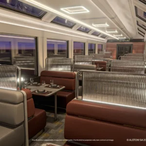 Official rendering of a VIA Rail dining-car interior with booths, tables and large windows