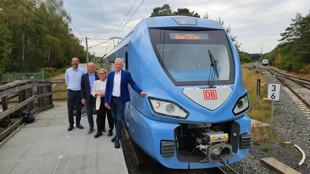 Blue CAF Class 557 battery train at Wildenrath with 273.2 km shown on its destination display