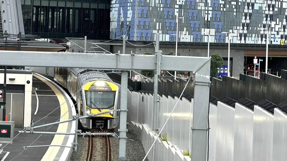 Auckland electric train beside Maungawhau Station during City Rail Link timetable testing