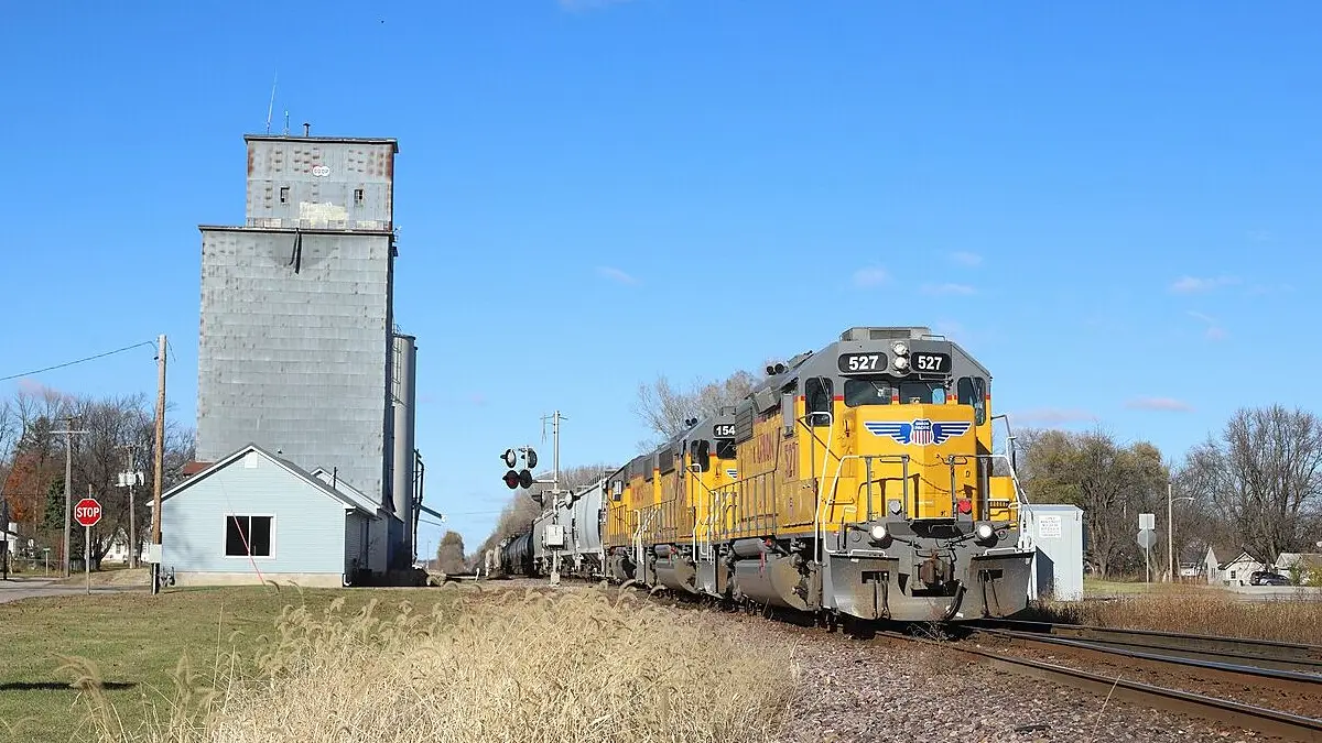 Union Pacific locomotives beside a grain elevator in Manly, Iowa