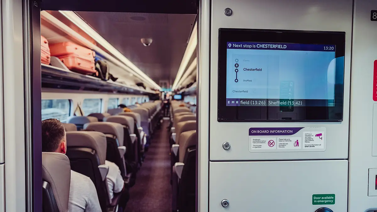 Passenger information screen inside an EMR Aurora showing Chesterfield as the next stop