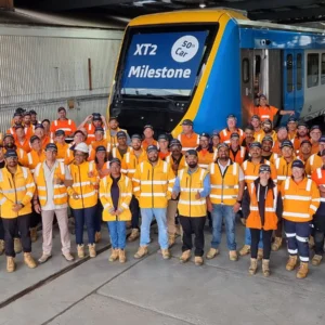 Ballarat manufacturing team with an X’Trapolis 2.0 train inside the Alstom facility