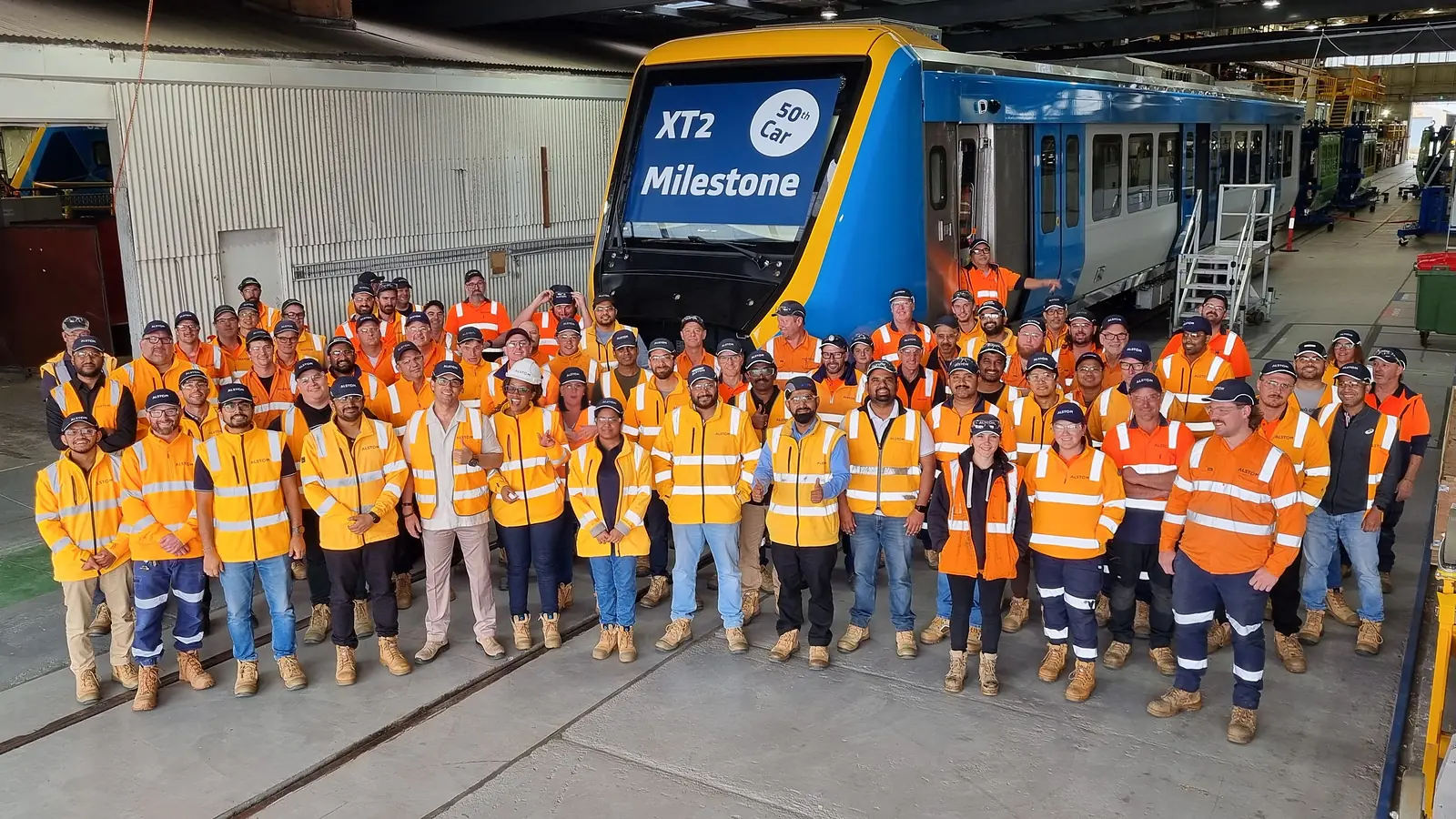 Ballarat manufacturing team with an X’Trapolis 2.0 train inside the Alstom facility