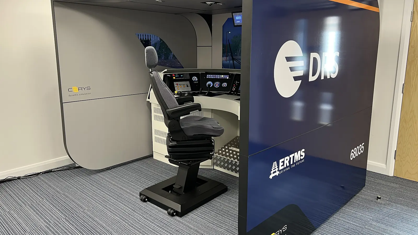 DRS ETCS simulator enclosure with its driving cab visible through the entrance