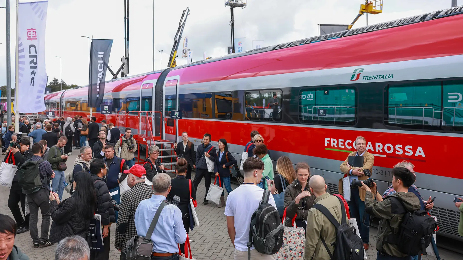 Trenitalia Frecciarossa ETR1000 surrounded by visitors on the InnoTrans outdoor tracks in Berlin