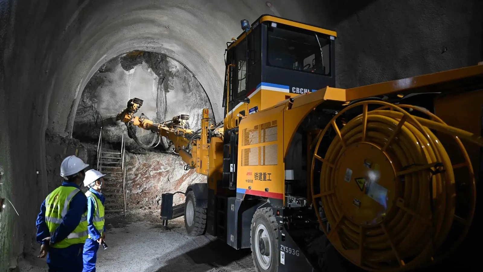 Drilling machine working inside a China-Kyrgyzstan-Uzbekistan railway tunnel