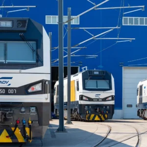 Three Azerbaijan Railways AC50 freight locomotives lined up at a Baku depot
