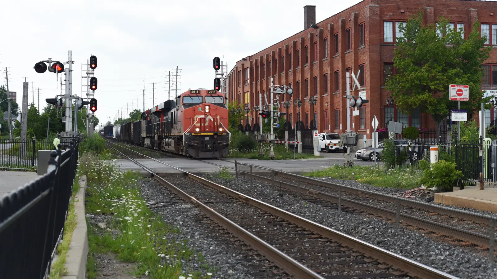 CN freight train approaching a railway crossing in Brampton, Ontario