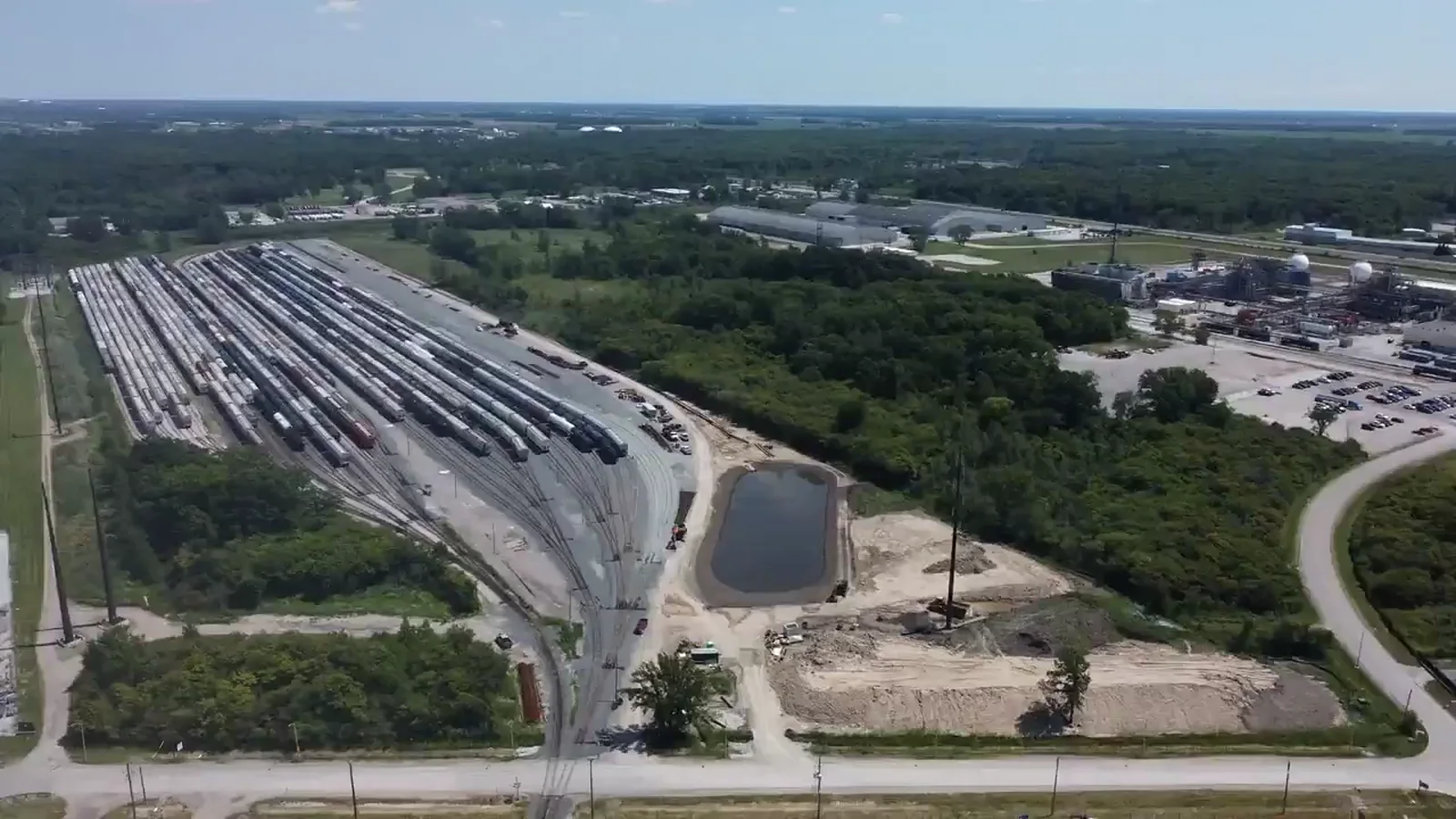 Aerial view of the VIP Rail Sarnia rail yard filled with rows of freight railcars