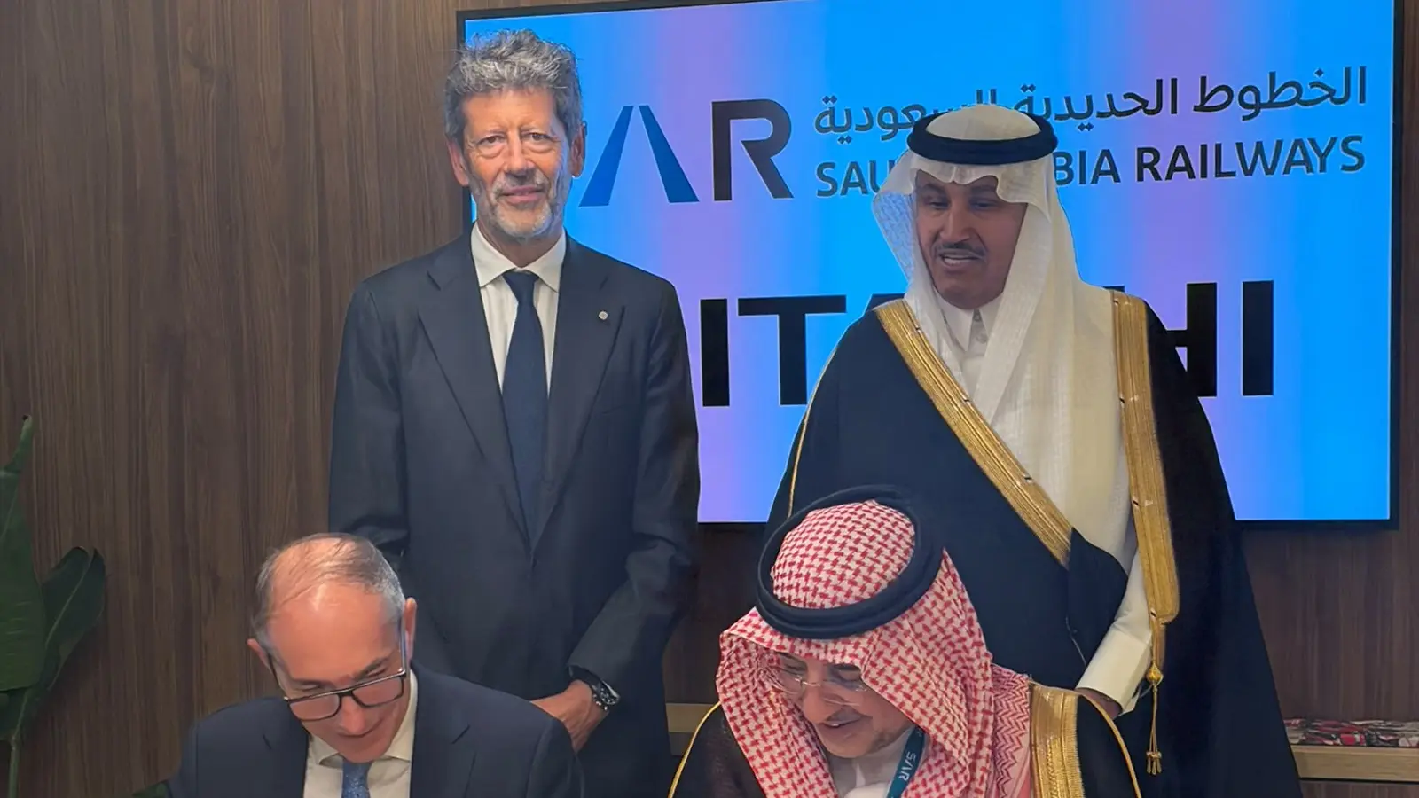 Hitachi Rail and Saudi Arabia Railways executives at the Hajj metro contract ceremony