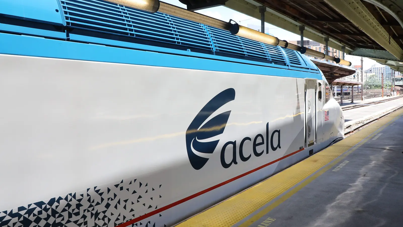 NextGen Acela trainset beside a station platform