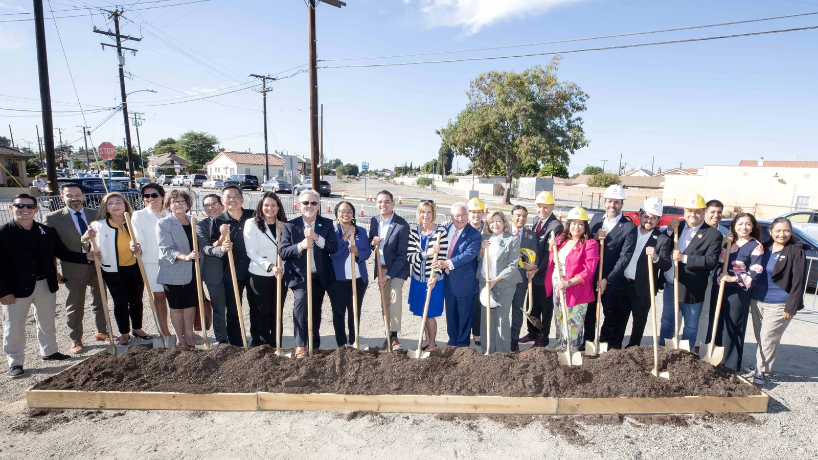 Group holding shovels at the Southeast Gateway Line groundbreaking in Artesia