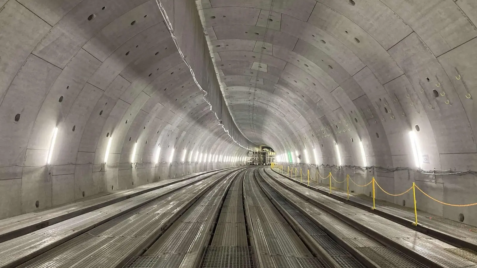 Interior of the Kita-Shinagawa tunnel with concrete segment lining and service tracks